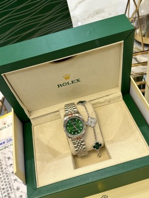The Rolex watch is a Datejust model.