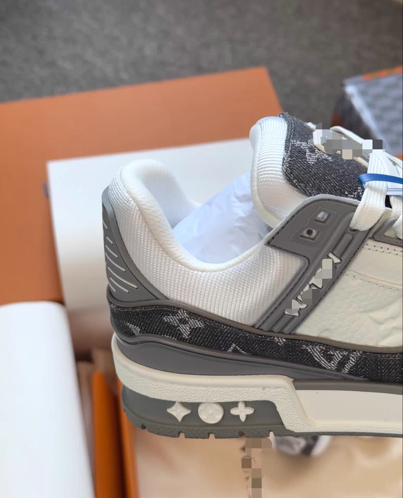 (Louis Vuitton) LV Trainer sneakers.