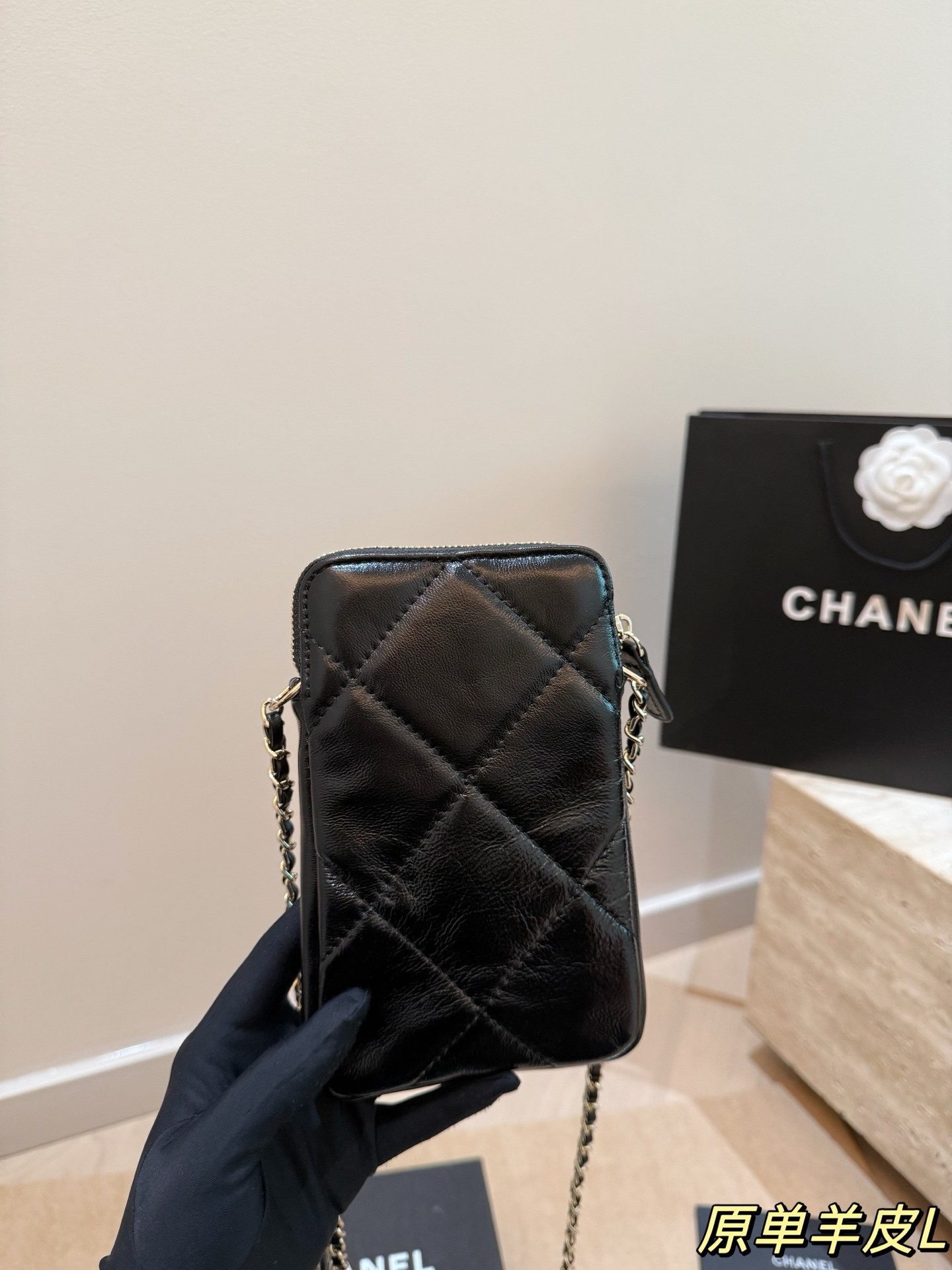 Chanel chain-strap phone case