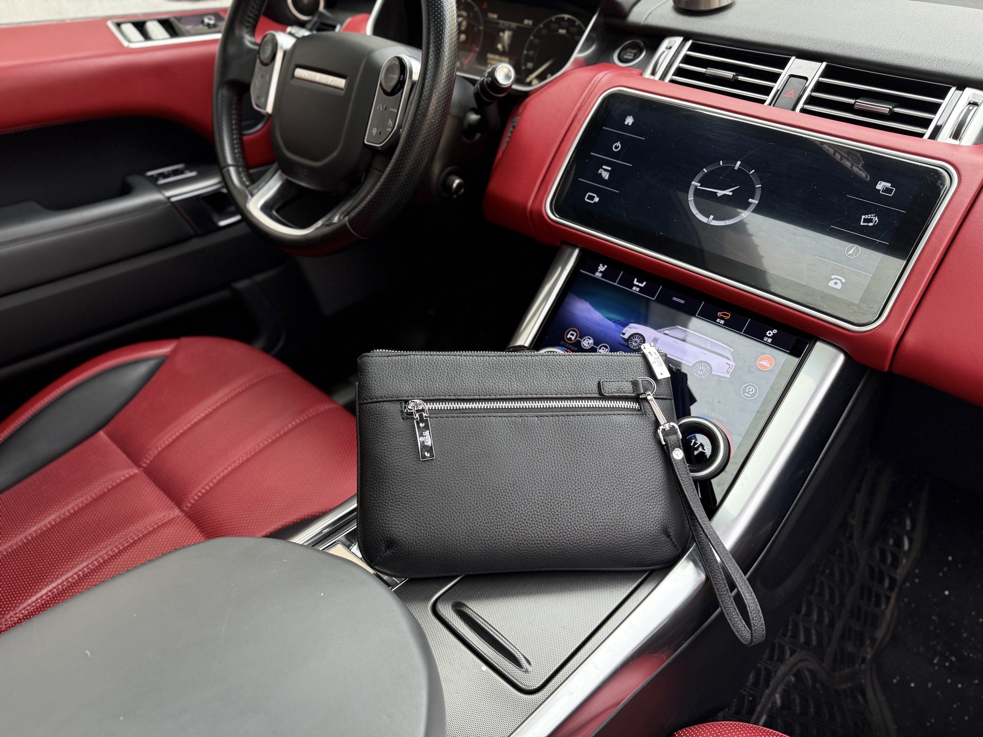 Gucci GG Embossed Leather Clutch