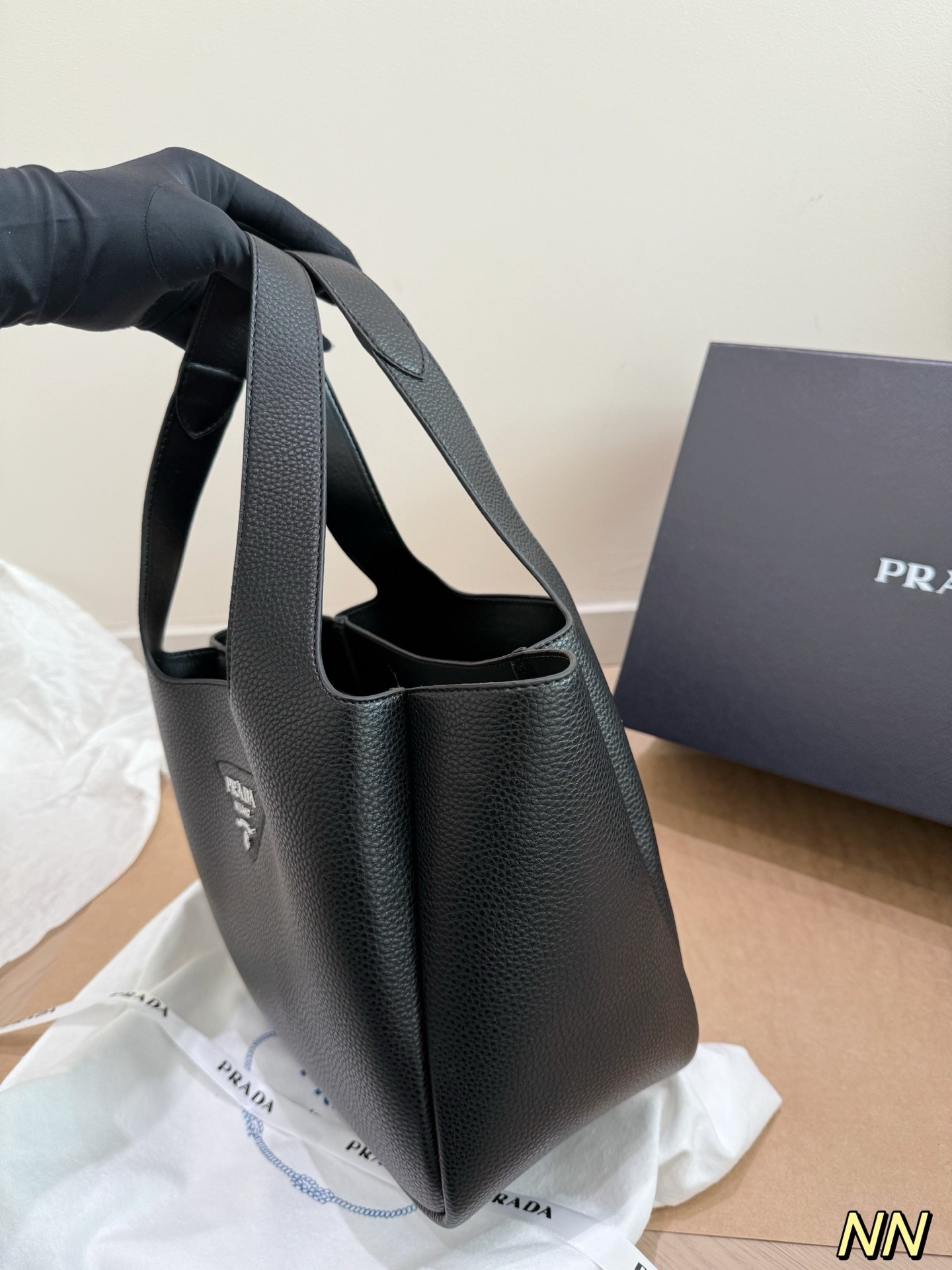 (Prada) black leather handbag