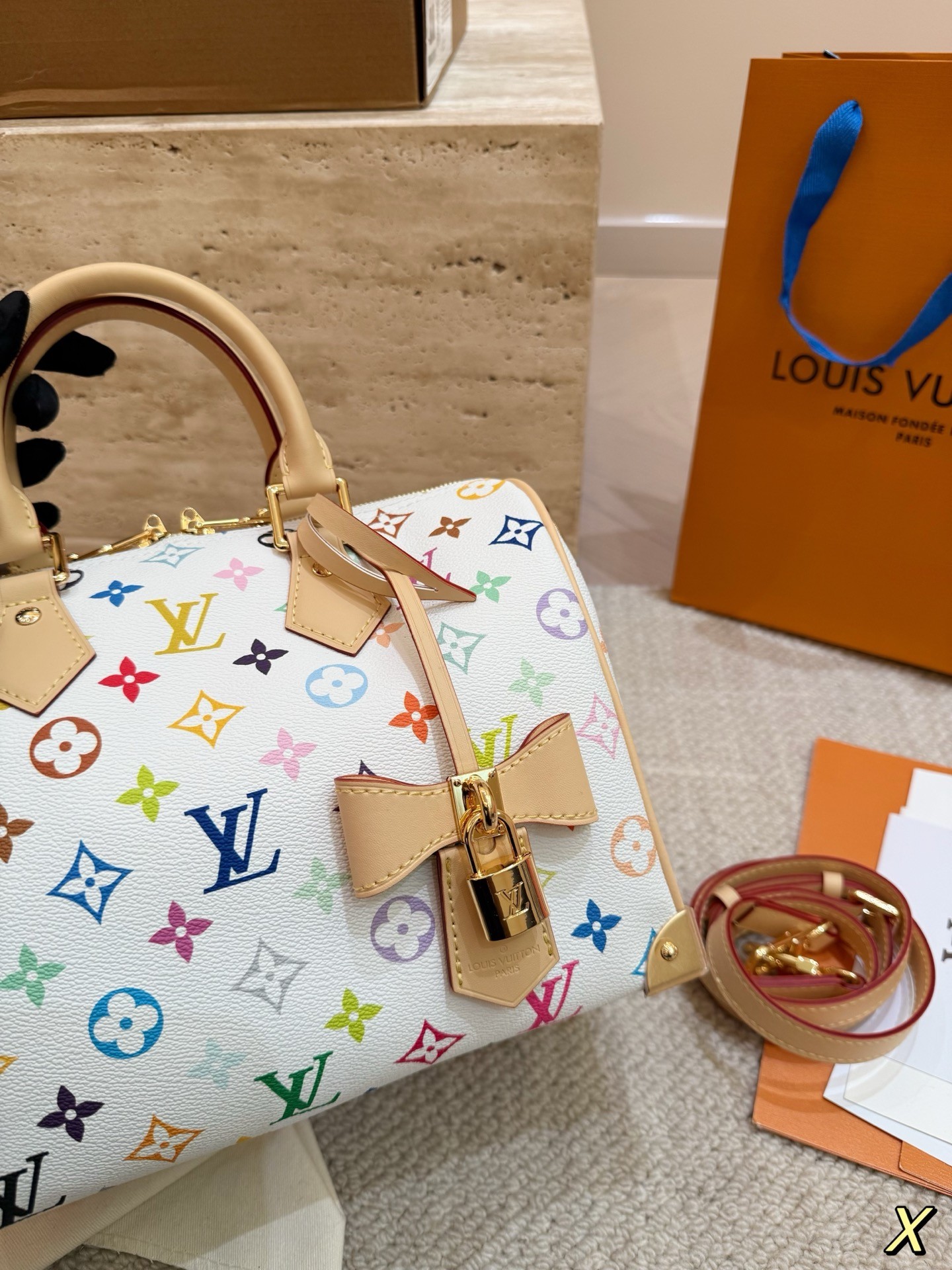 The limited-edition Speedy Bandoulière 25 from Louis Vuitton's collaboration with Japanese artist Takashi Murakami.