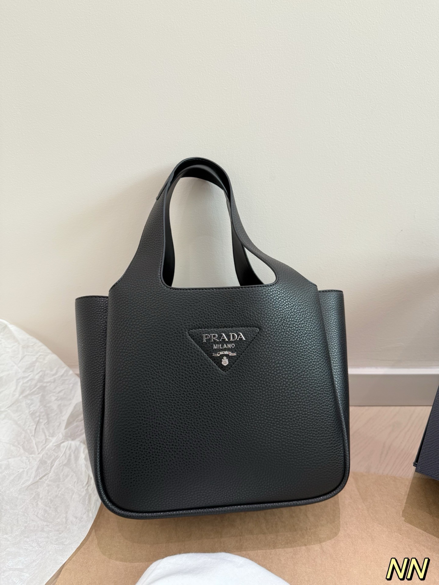 (Prada) black leather handbag