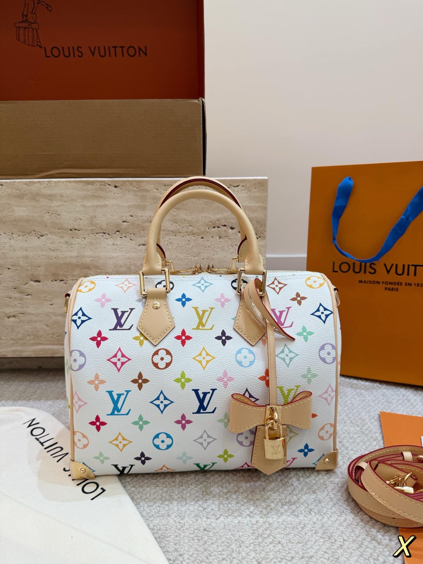 The limited-edition Speedy Bandoulière 25 from Louis Vuitton's collaboration with Japanese artist Takashi Murakami.