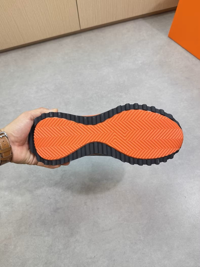 (Hermès) Bouncing sneakers.