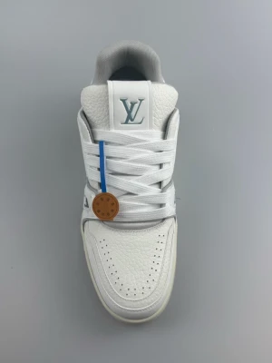 (Louis Vuitton) LV Trainer sneakers.