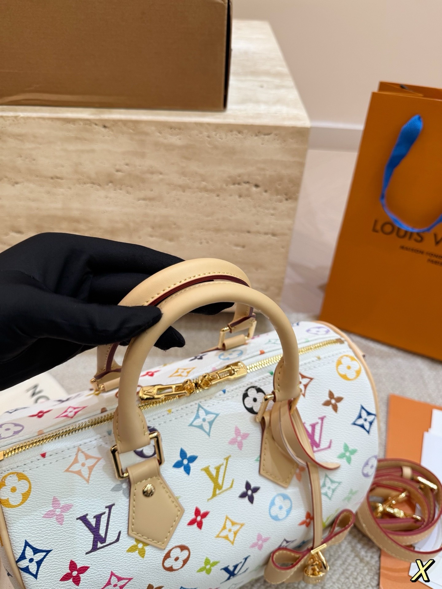 The limited-edition Speedy Bandoulière 25 from Louis Vuitton's collaboration with Japanese artist Takashi Murakami.