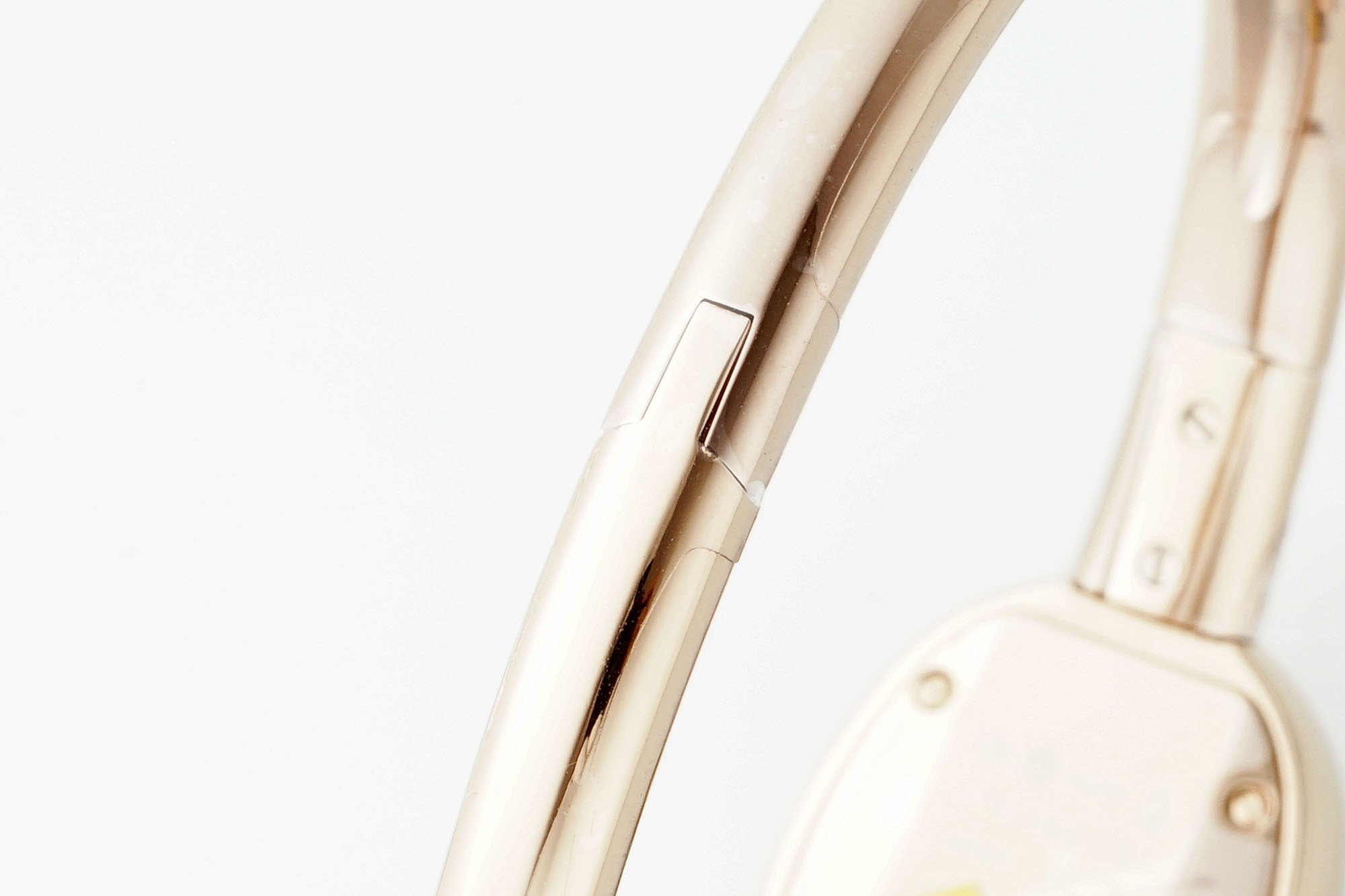 (Cartier) Miniature Gold Bracelet Watch from the Baignoire Collection