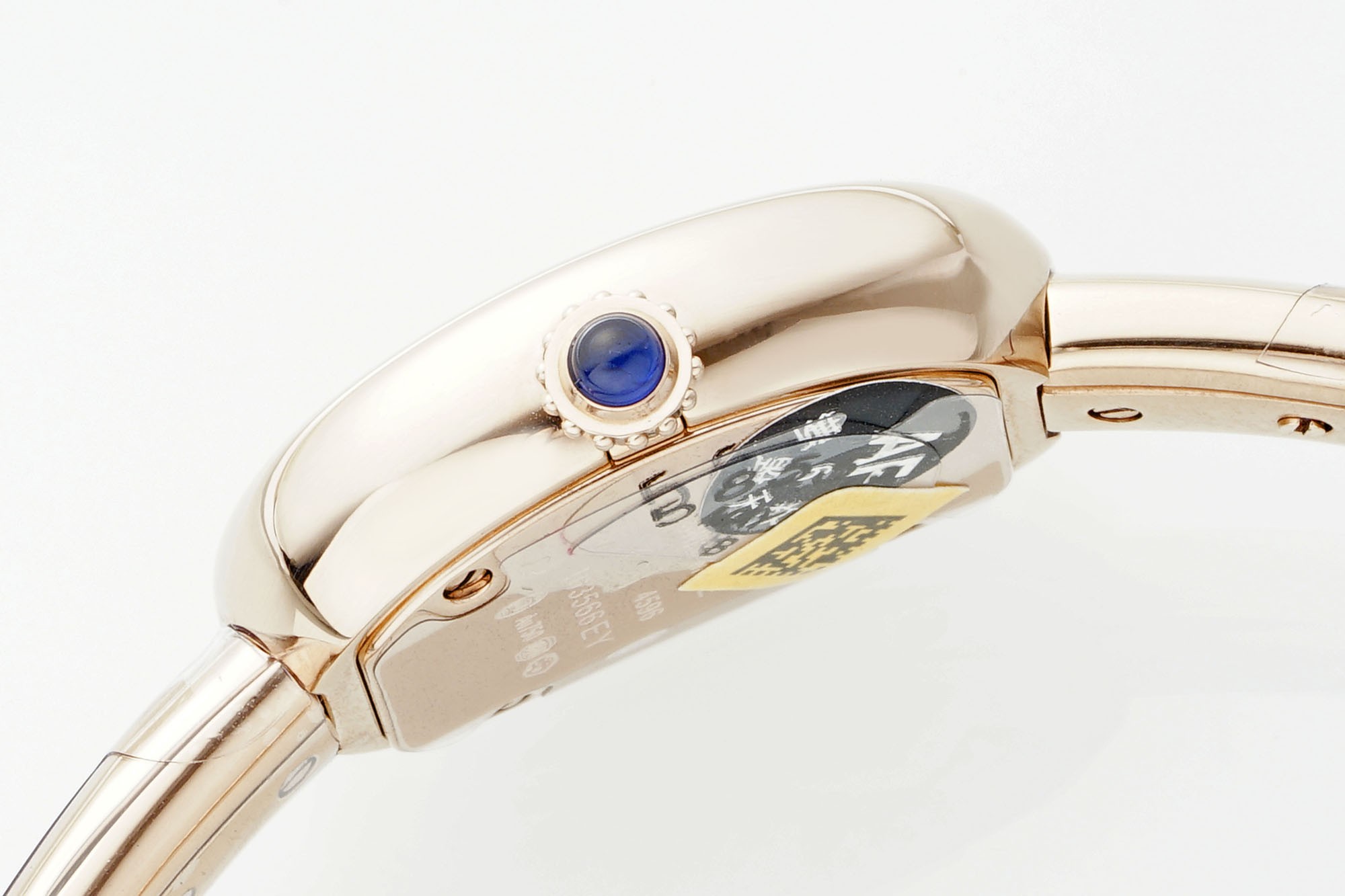 (Cartier) Miniature Gold Bracelet Watch from the Baignoire Collection
