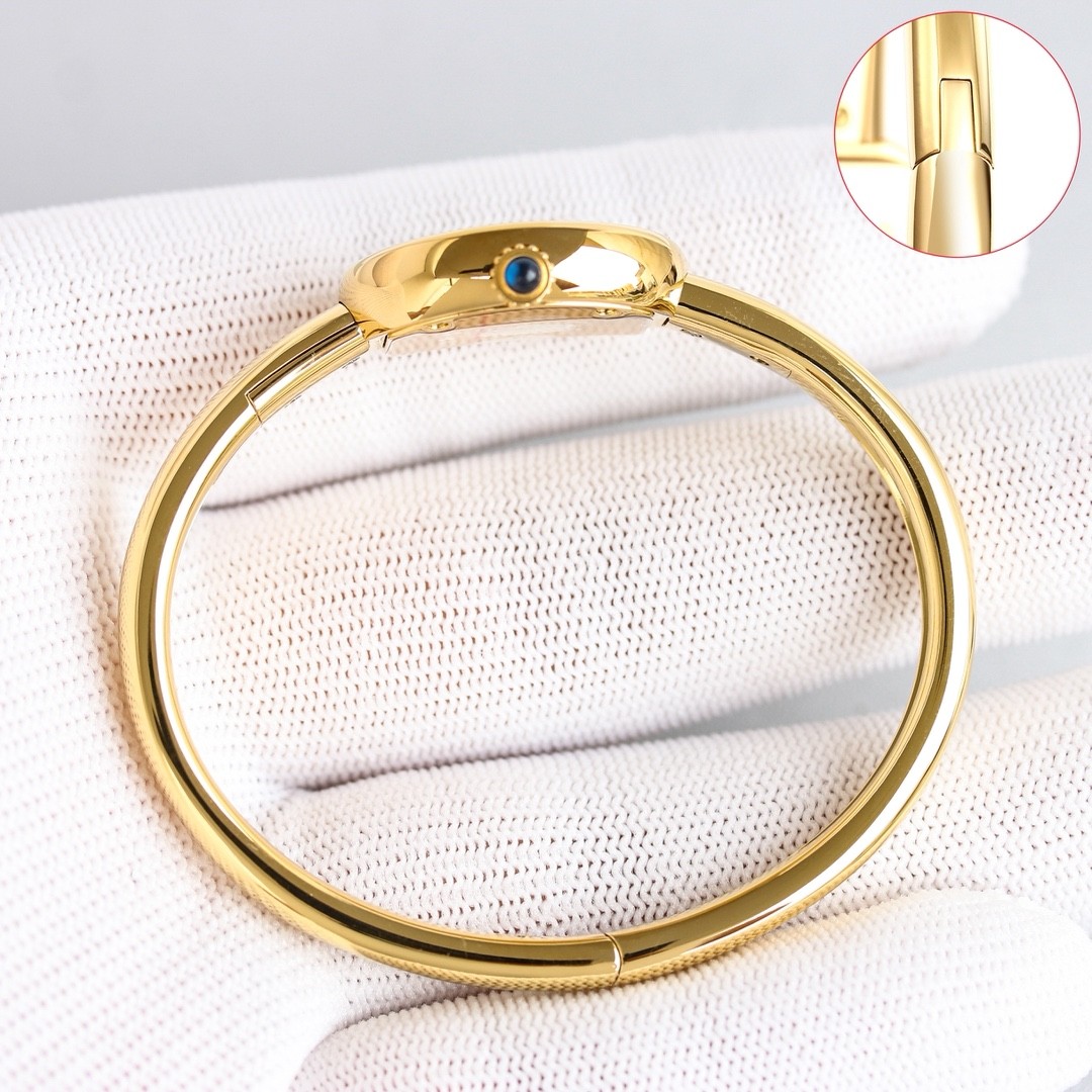 A mini bracelet watch from Cartier’s Baignoire collection.