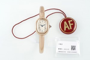 (Cartier) Miniature Gold Bracelet Watch from the Baignoire Collection